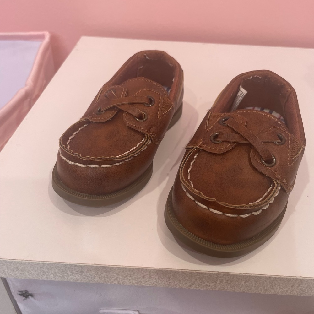 Pre owned Carters toddler boat shoes size 6.